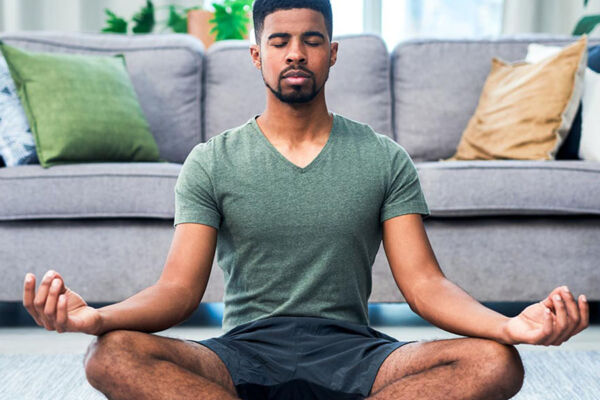 Adult male meditating, showing the importance of mindfulness exercises