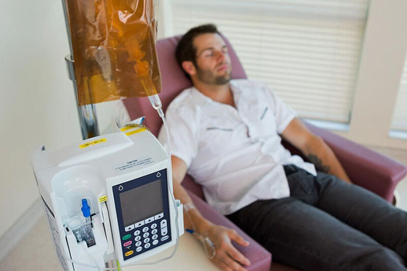 Adult man undergoing ketamine for pain management.