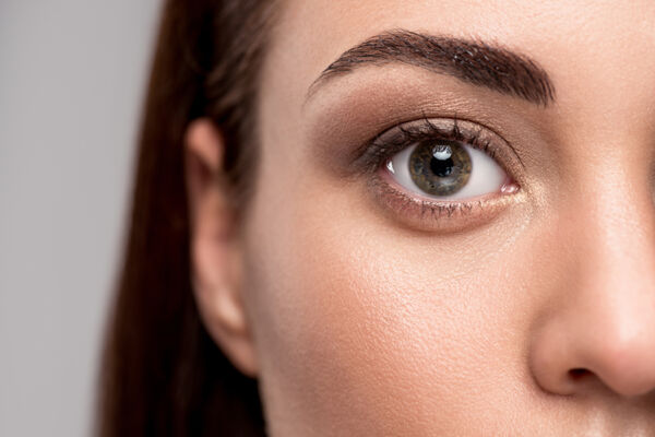 Close-up of a woman's eye, representing the focus on eye movement in EMDR therapy