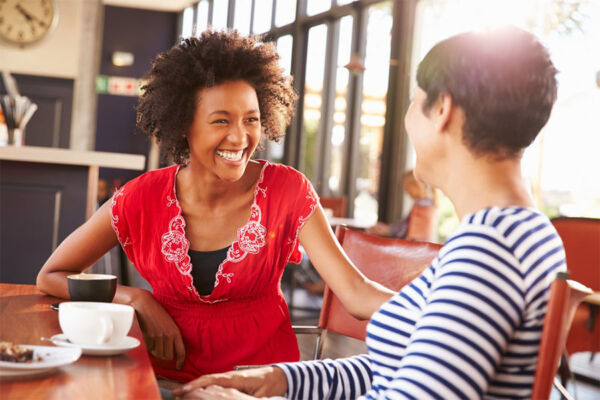 Friends having conversation, showing the importance of interpersonal communication