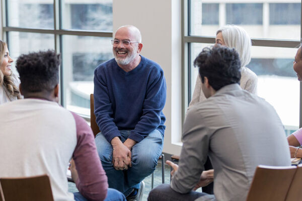 A group therapy session providing long-term sobriety support in Phoenix, Arizona, as part of addiction recovery programs