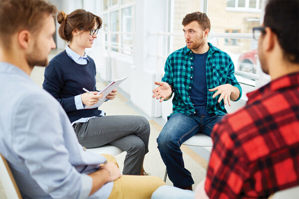 Group therapy session for patients struggling with opioid use disorders