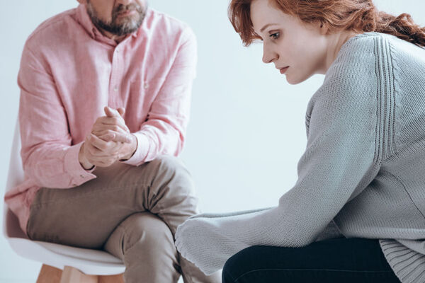 Woman engaged in individual therapy session, part of in-network Aetna mental health treatment